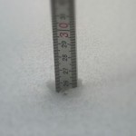 Ruler measuring snow