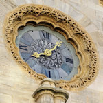 Clock outside Stephansdom