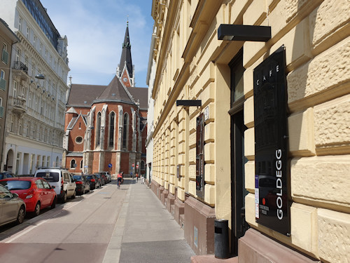 Café Goldegg and church