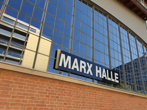 Windows of the Marx Halle venue with sign