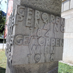 Stone cube with inscription