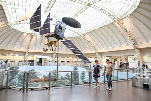 Model of a satellite hanging in a museum