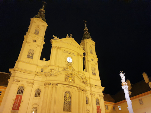 Outside the Piaristenkirche at night
