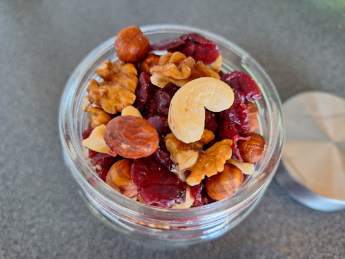 A jar of dried fruit and nuts