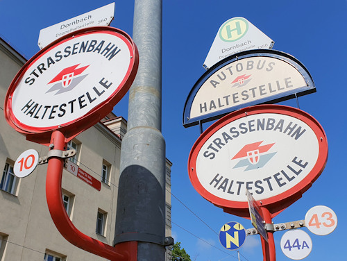 Signs at a tram and bus stop