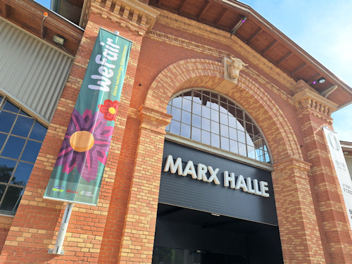 WeFair banner hanging outside the Marx Halle